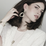 Alaya IN:STORE Pendiente asimétrico chapado en oro