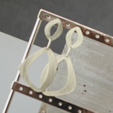 Alaya IN:STORE Pendiente asimétrico chapado en oro