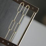 Tempeste IN:STORE Pendiente largo clip baño de oro