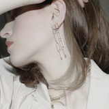 Tempeste IN:STORE Pendiente largo clip baño de oro