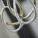 Elysian IN:STORE Pendiente de 2 tonos chapado en oro