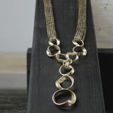 Anastazia IN:STORE Långt stickat fluidhalsband guldplätering