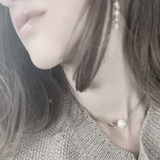 Audrey IN:STORE Korte stippel & parelketting verguld