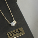 Audrey IN:STORE Korte stippel & parelketting verguld
