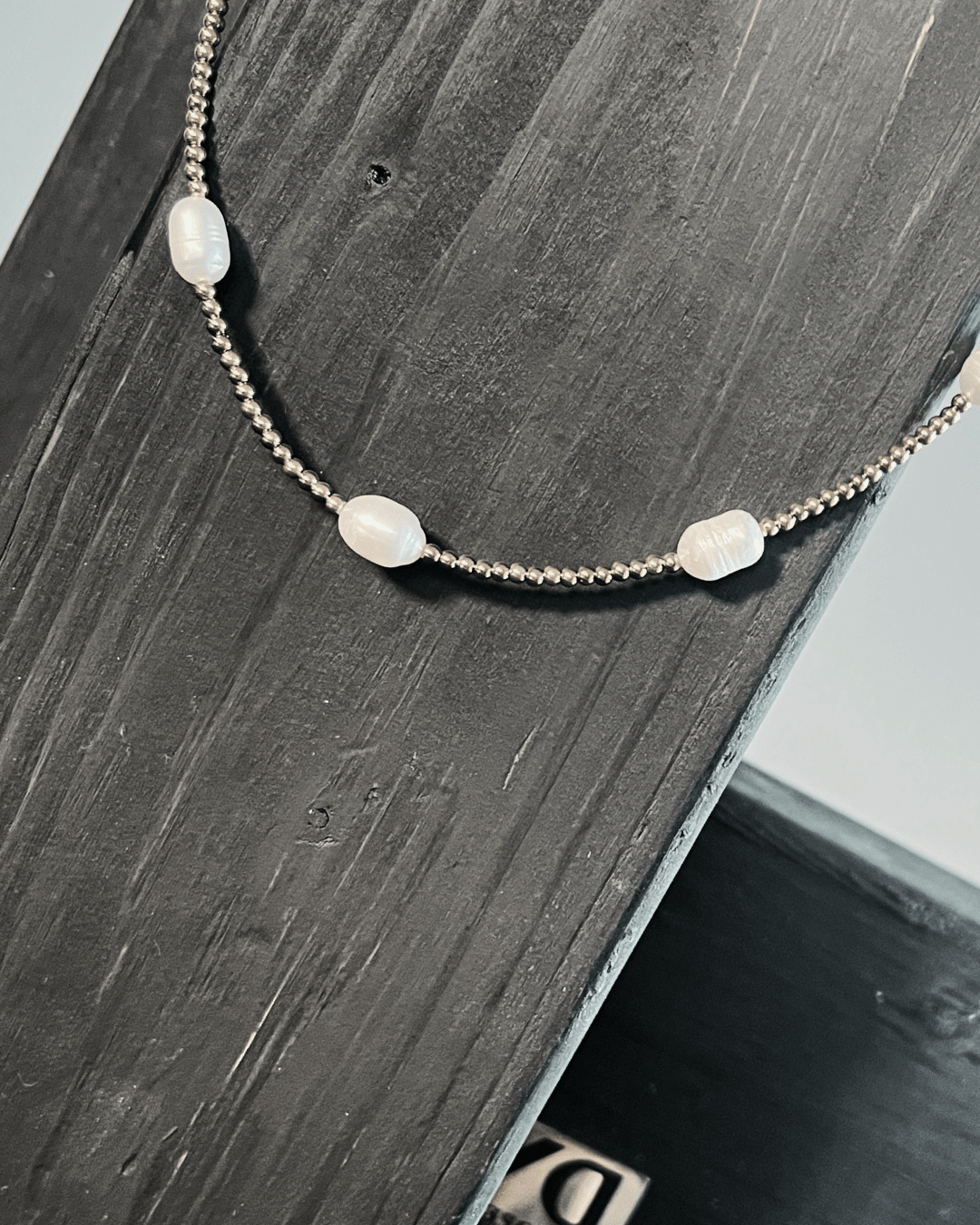 Joy Waterproof Short Singular Freshwater Pearl & Mini Ball Necklace 18K Gold Plating - DANSK Copenhagen