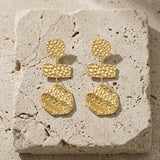 MARIN Waterproof 18K Gold Plated Statement Earrings – Hammered Stainless Steel - DANSK Copenhagen