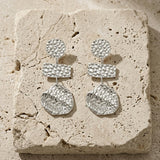 MARIN Waterproof Silver Stainless Steel Statement Earrings – Hammered Finish - DANSK Copenhagen