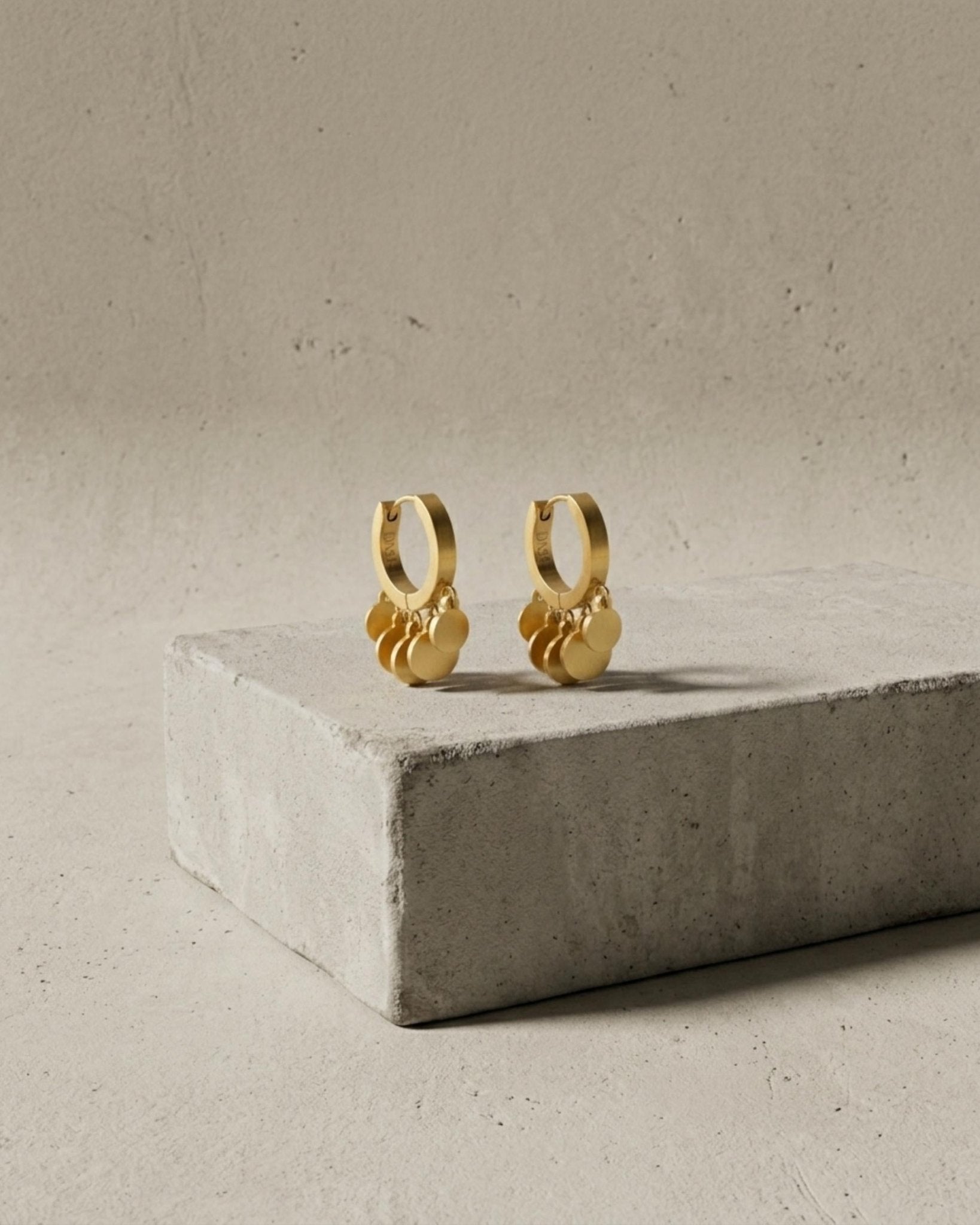 NORA Waterproof 18K Gold Plated Huggies – Brushed Stainless Steel - DANSK Copenhagen