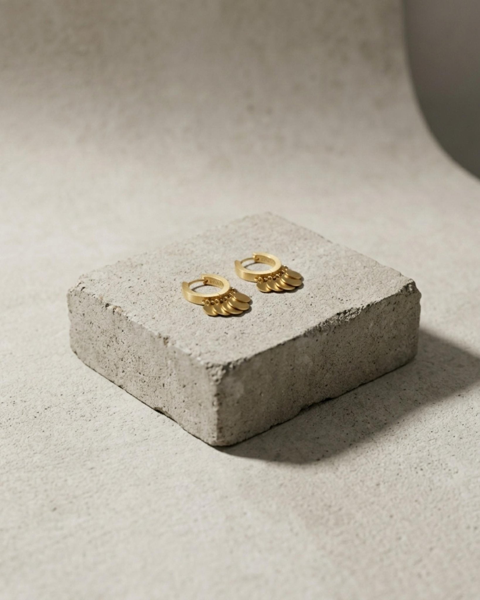 NORA Waterproof 18K Gold Plated Huggies – Brushed Stainless Steel - DANSK Copenhagen