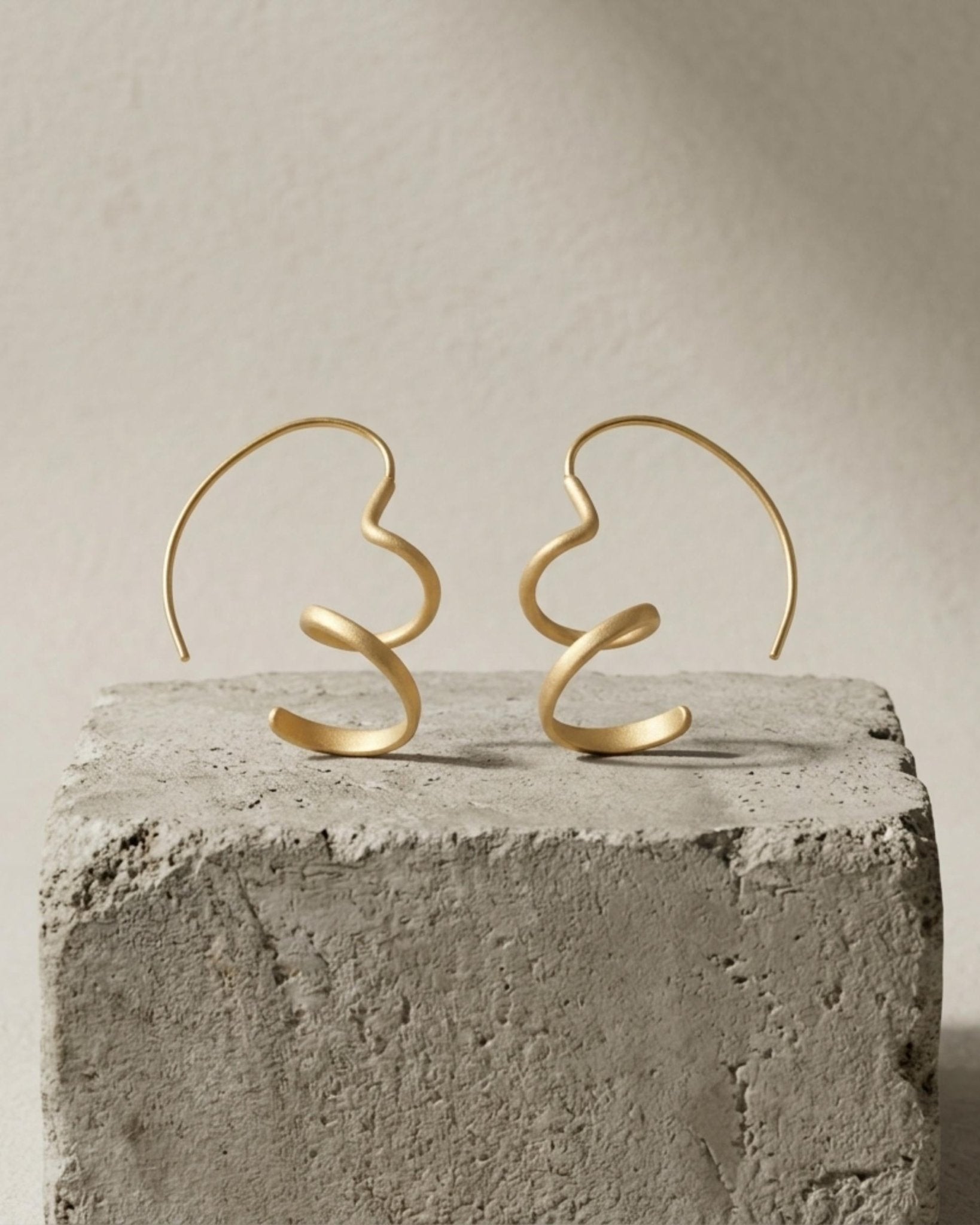 VERA Waterproof 18K Gold Plated Mini Spinning Earring – Sanded Stainless Steel - DANSK Copenhagen