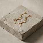 VERA Waterproof 18K Gold Plated Revolve Earring – Sanded Stainless Steel - DANSK Copenhagen