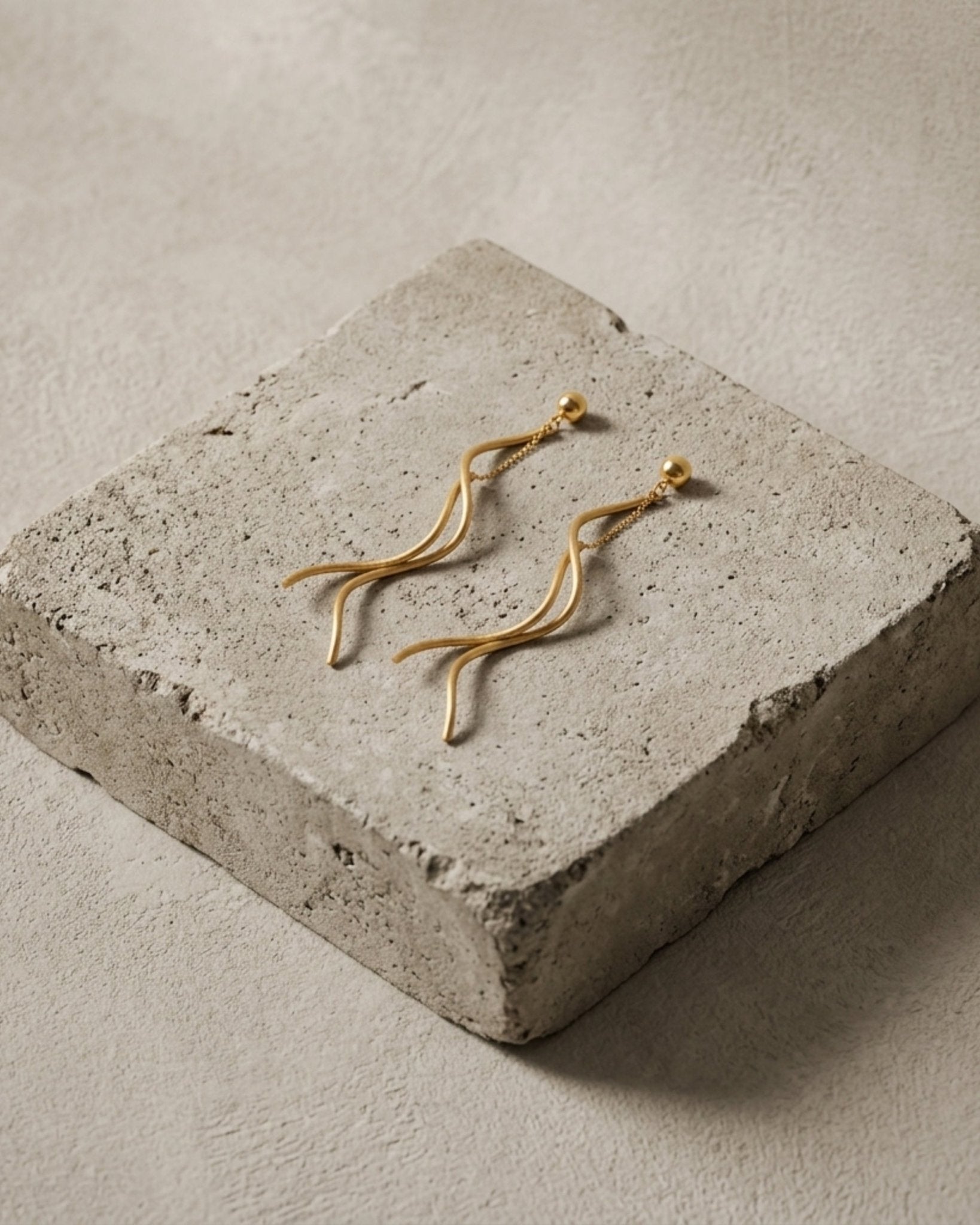 VERA Waterproof 18K Gold Plated Revolve Earring – Sanded Stainless Steel - DANSK Copenhagen