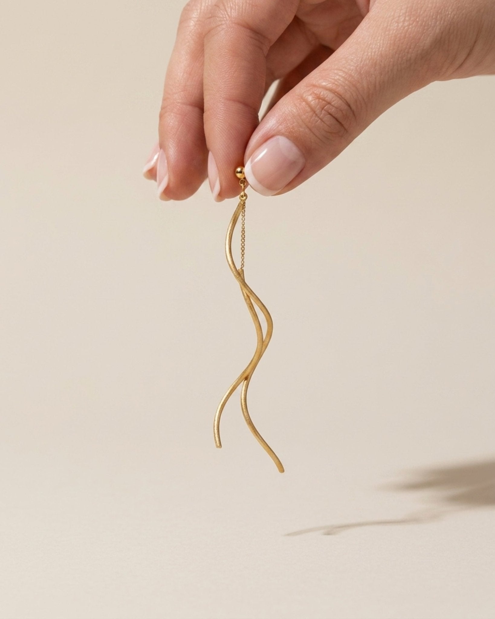 VERA Waterproof 18K Gold Plated Revolve Earring – Sanded Stainless Steel - DANSK Copenhagen