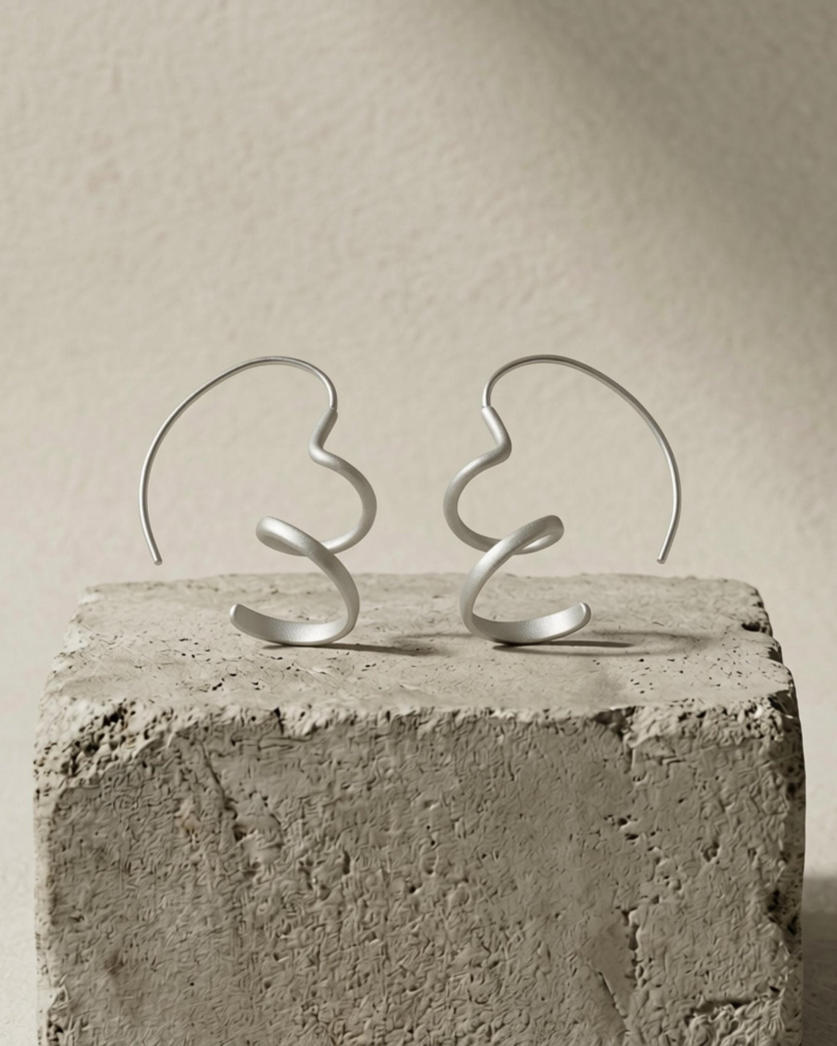 VERA Waterproof Silver Stainless Mini Spinning Earring – Sanded Finish - DANSK Copenhagen